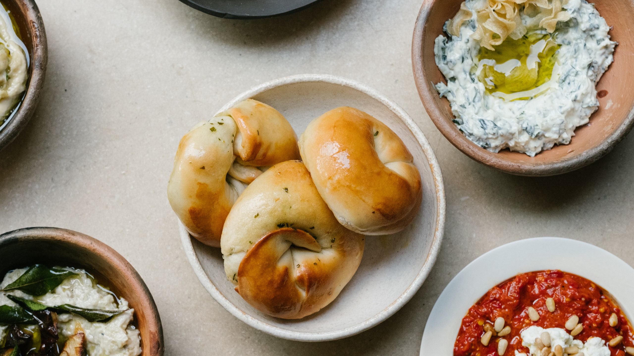 Image may contain Food Food Presentation Brunch Bread Plate and Bagel